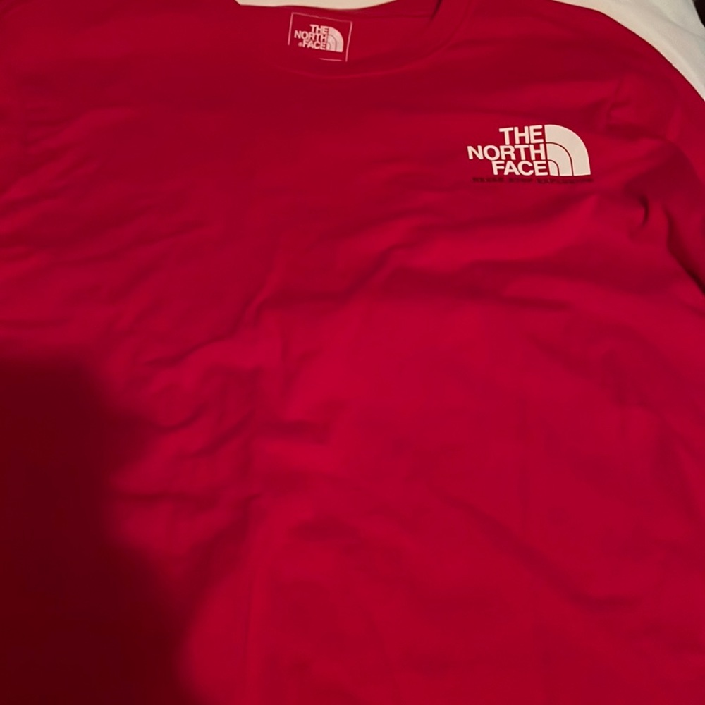 Plain red north face long sleeve top. Size medium. Never worn